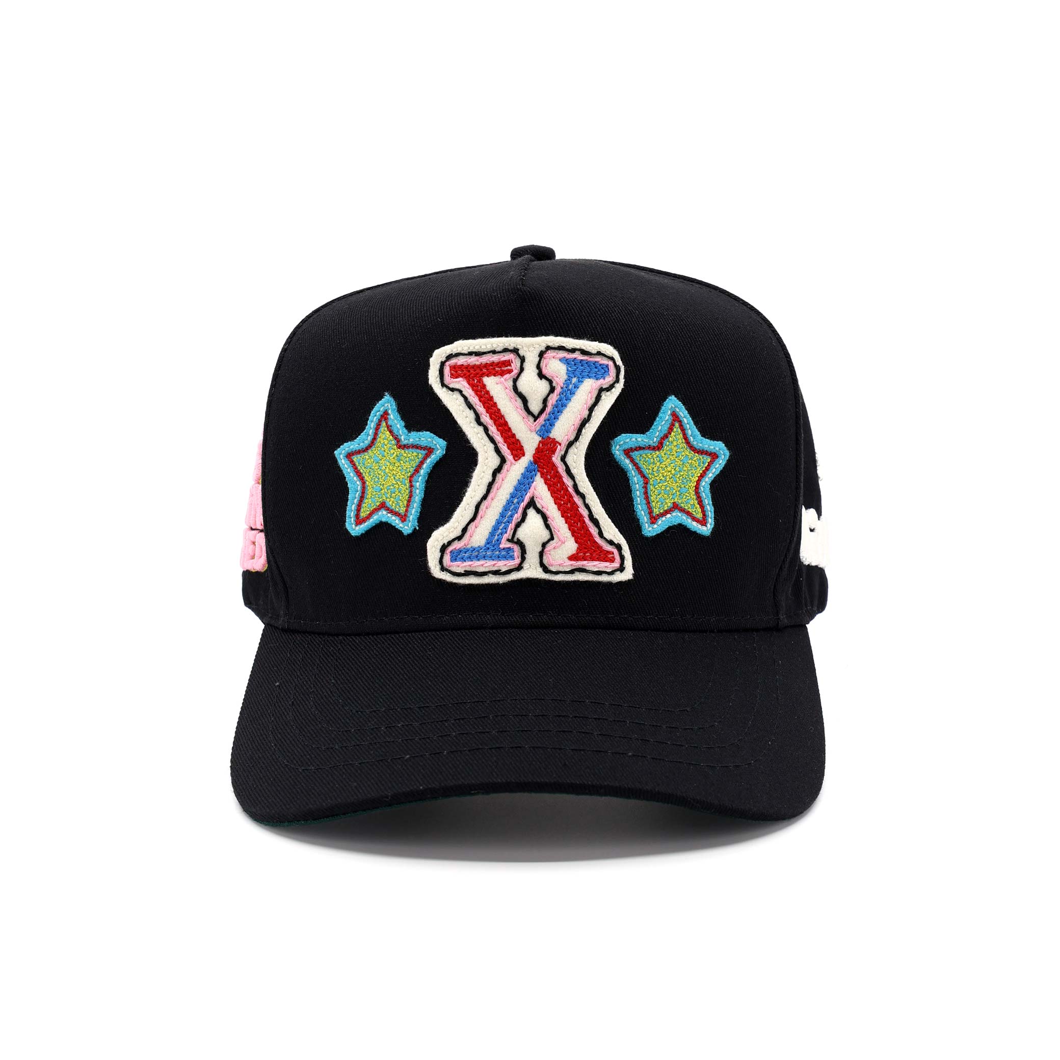 Black cap with colorful 'X' and star designs on a white background