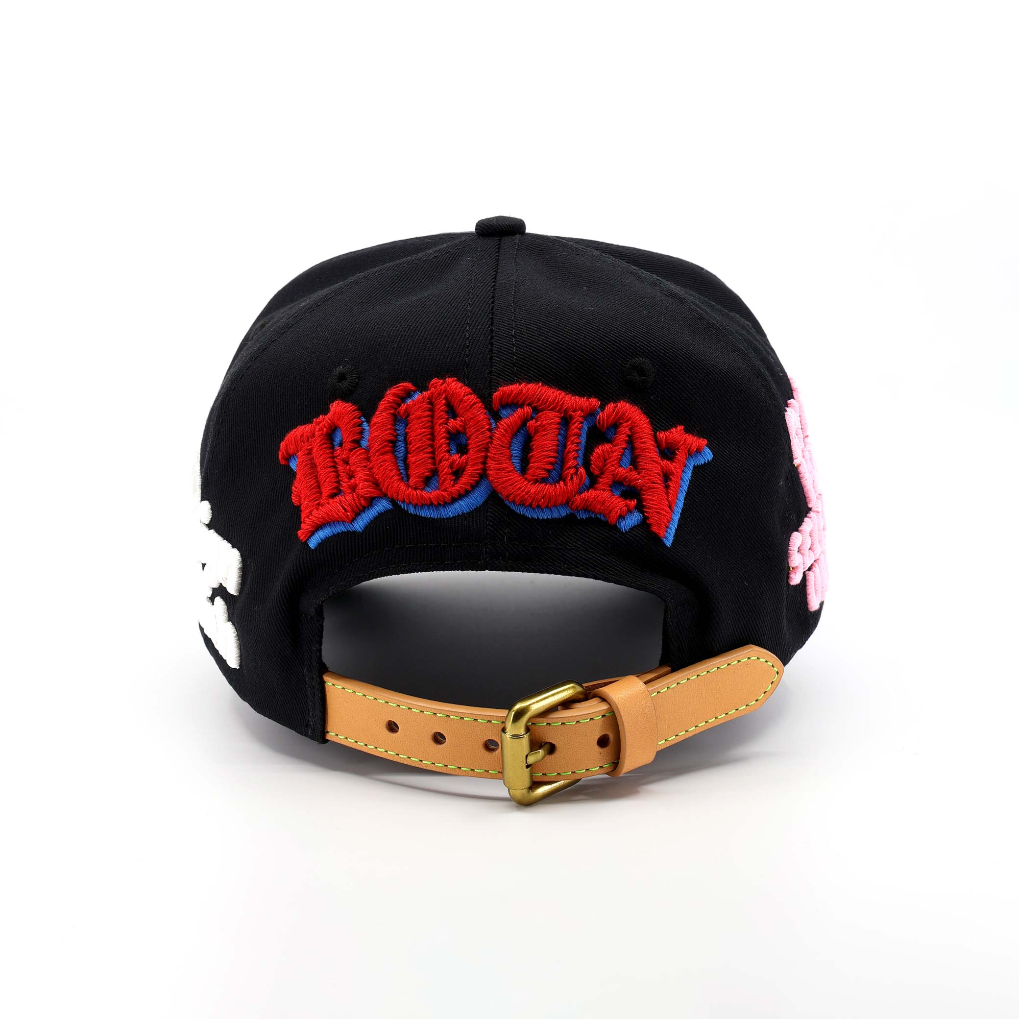 Black cap with red and blue text on a white background