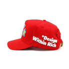 Red cap with 'Design Within Rich' text on a white background