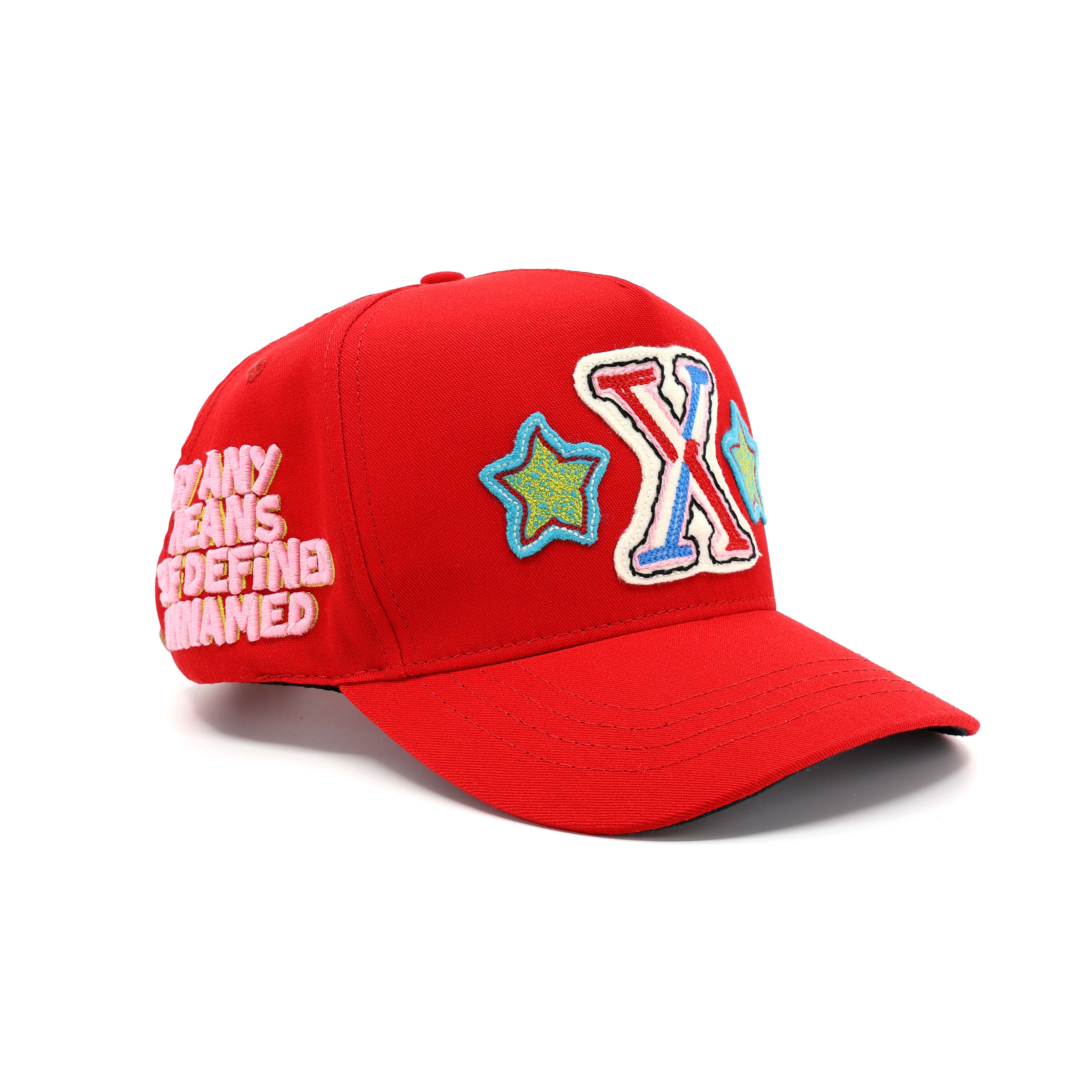 Red cap with colorful designs and text on a white background