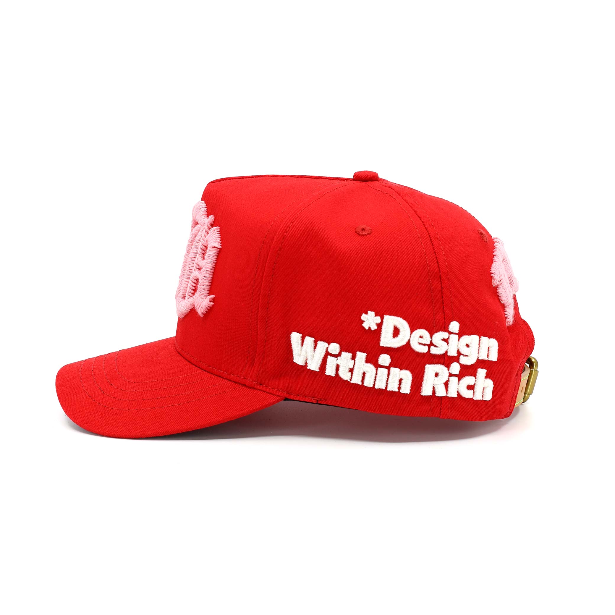 Red cap with 'Design Within Rich' text on a white background
