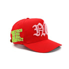 Red cap with green and white text on a white background