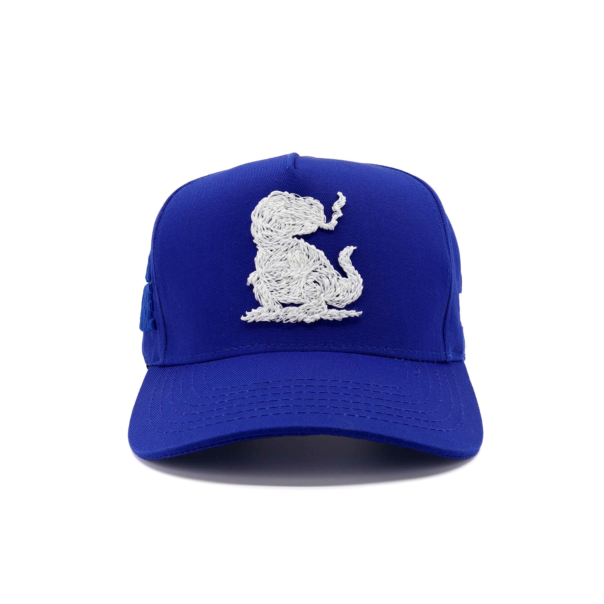 Blue cap with a white embroidered dog design on a white background