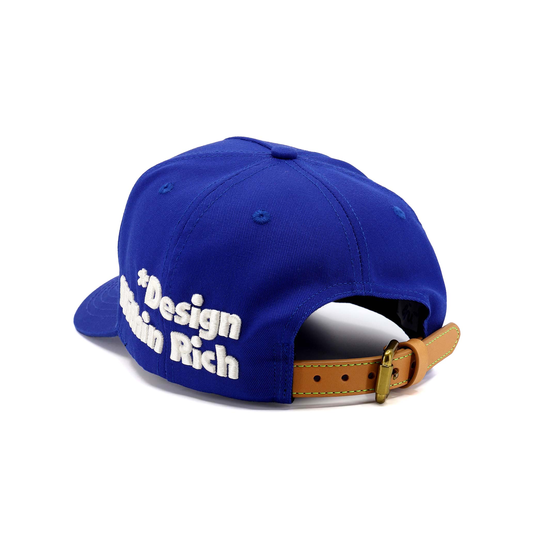Blue cap with white text and brown leather strap on a white background