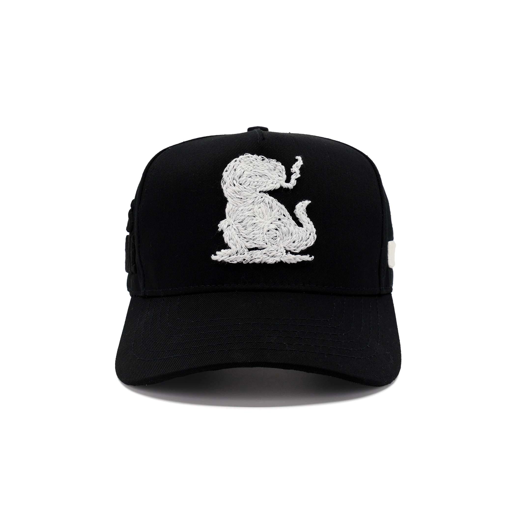 Black cap with white embroidered dog design on a white background
