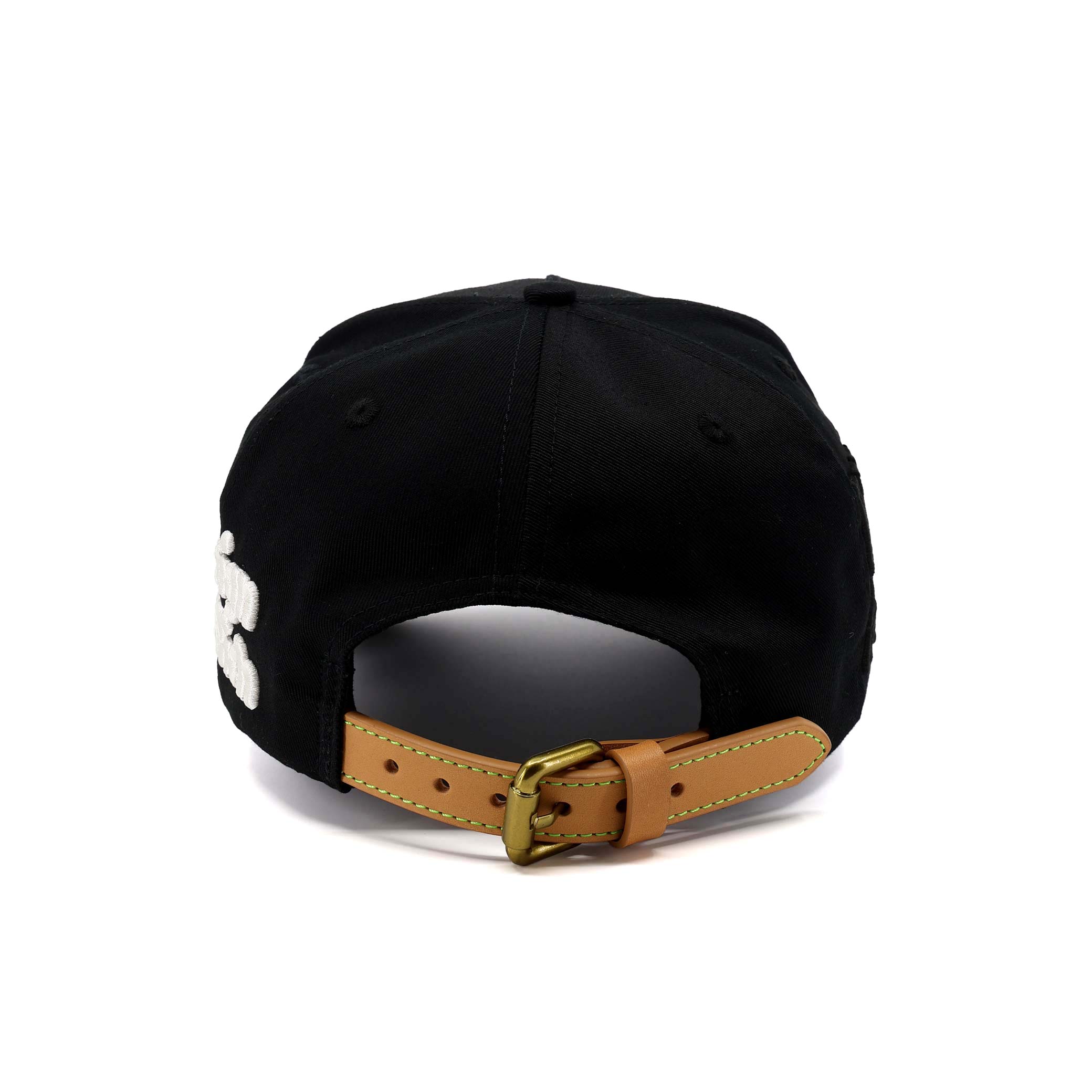 Black cap with a brown leather strap and gold buckle on a white background