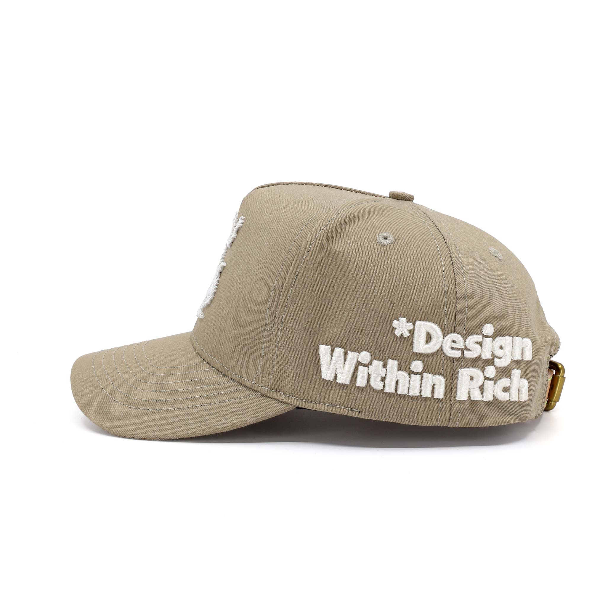 Beige cap with 'Design Within Rich' text on a white background
