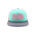 Trucker hat with pink monogram on a white background