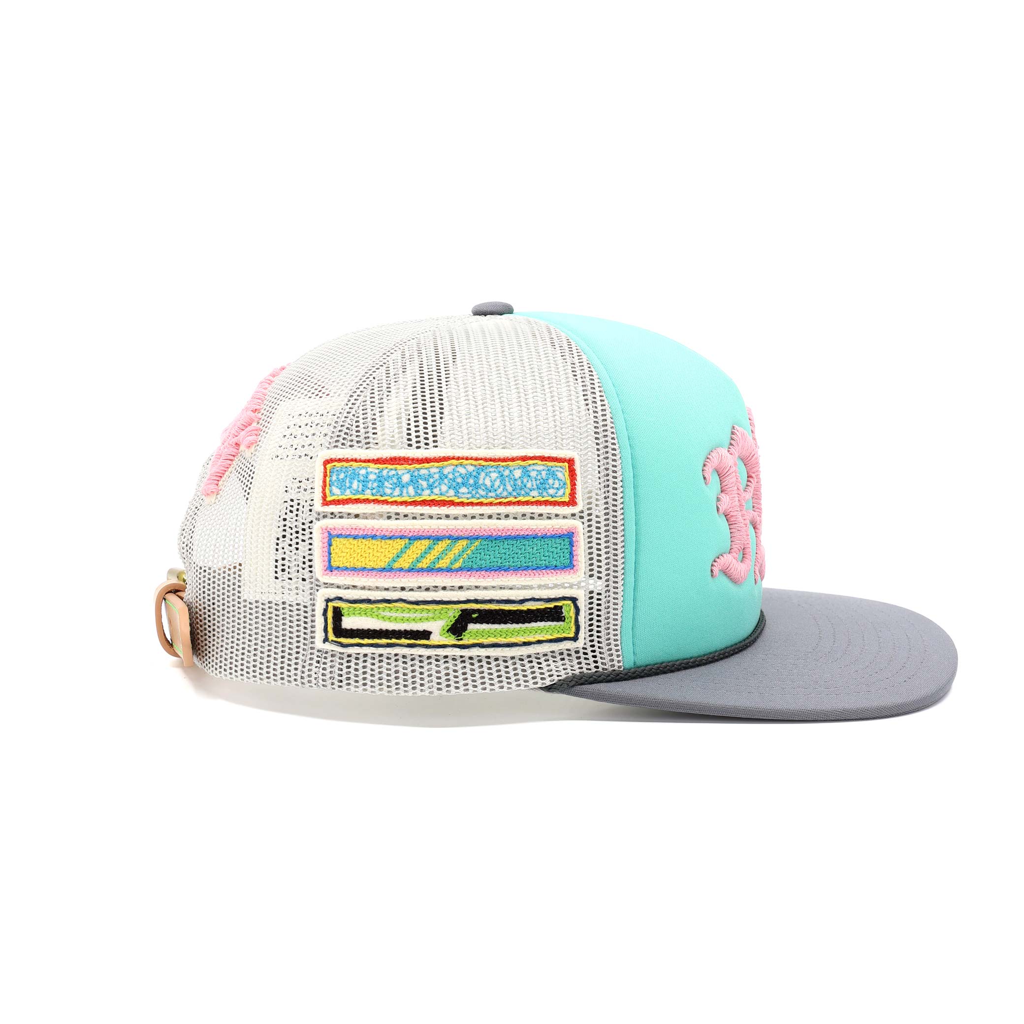 Colorful trucker hat with a pink flower design on a white background
