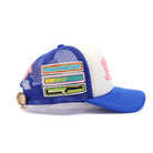 Blue and white cap with colorful design on a white background