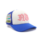 Blue and white cap with pink embroidery on a white background
